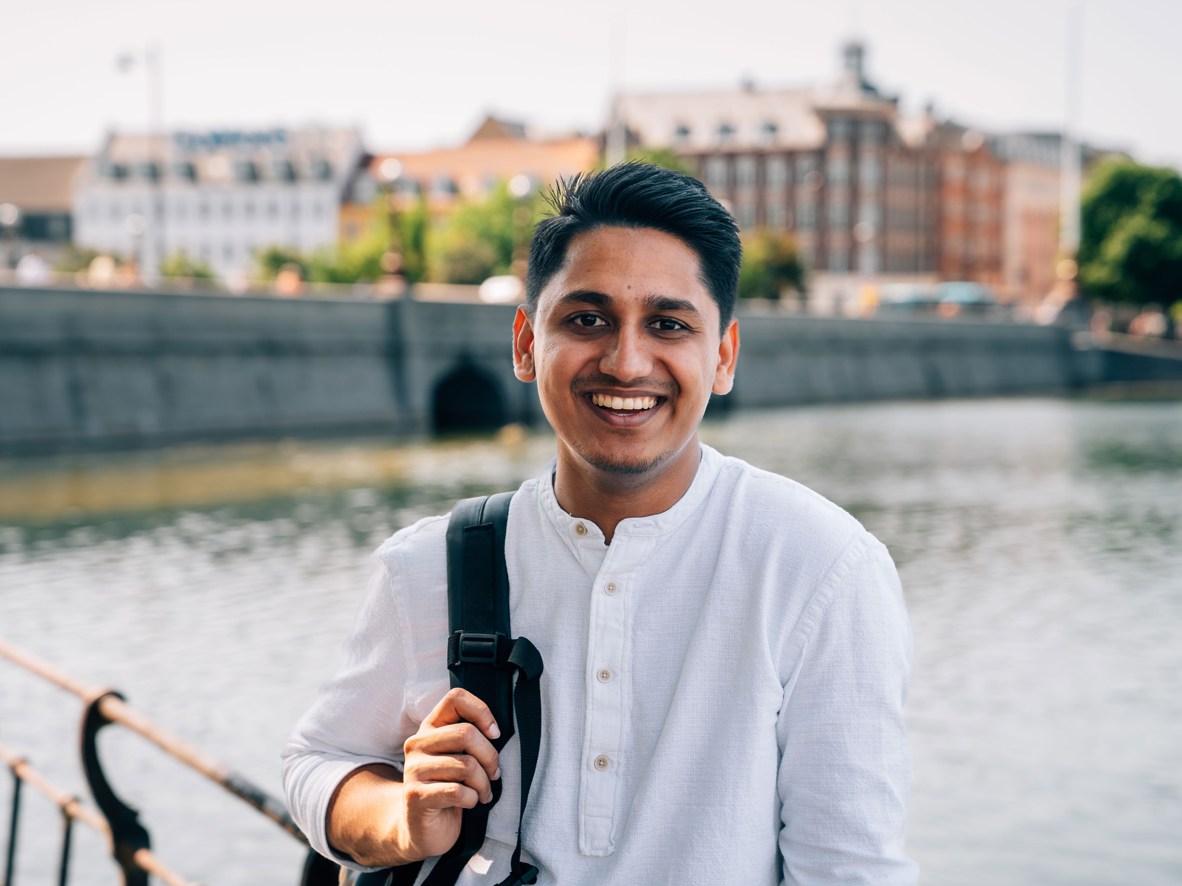 A student from Niels Brock Copenhagen Business College smiling