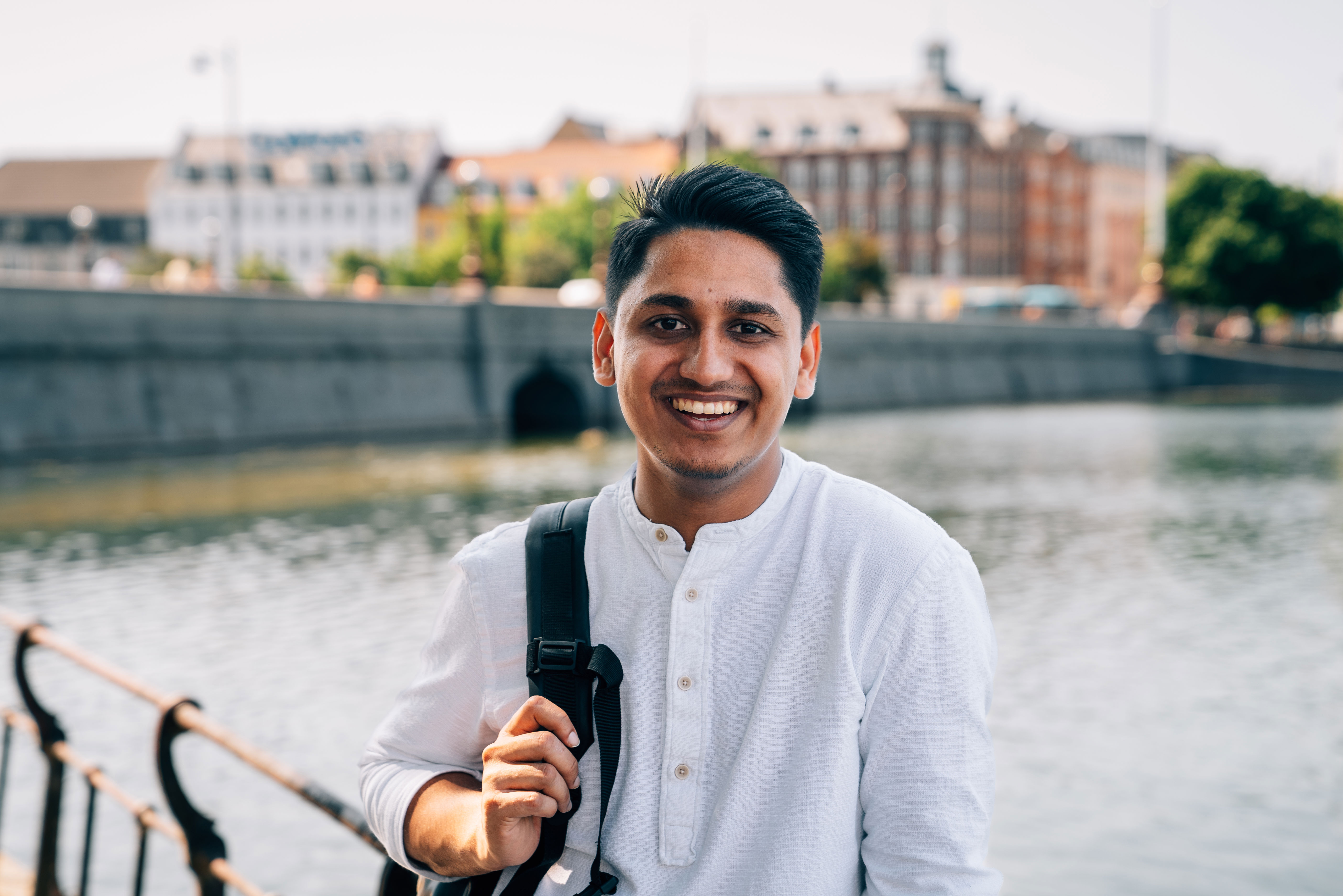 A student from Niels Brock Copenhagen Business College smiling